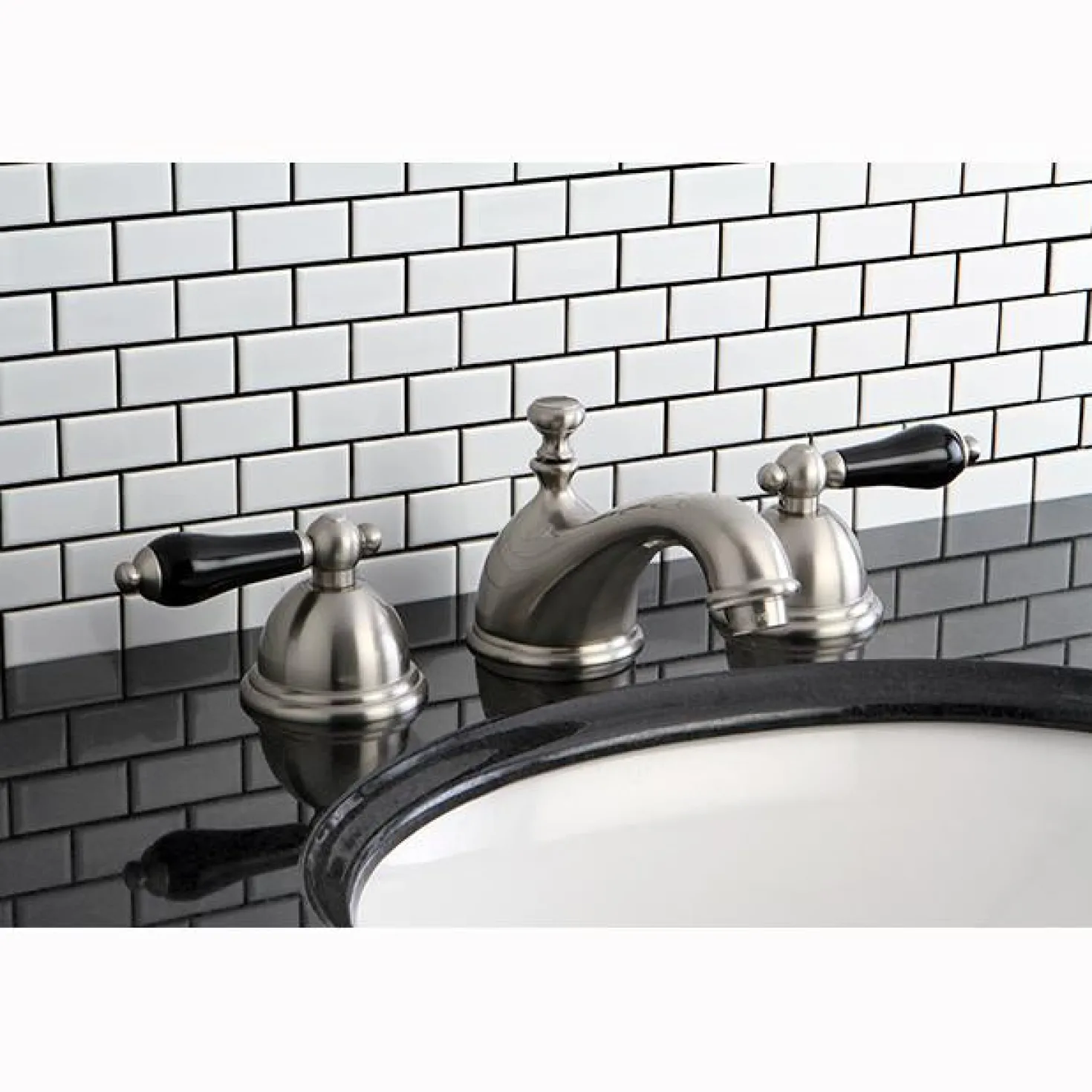 Kingston Brass Restoration Onyx Widespread Lavatory Faucet with Black Porcelain Lever Handle