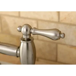 Kingston Brass Restoration Two-Handle Kitchen Bridge Faucet with Brass Sprayer