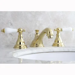 Kingston Brass Royale Three Hole Two Handle 8" to 16" Widespread Lavatory Faucet with Brass Pop-up