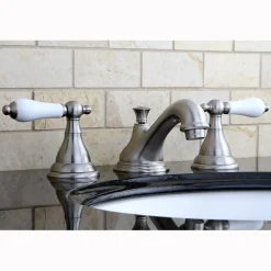 Kingston Brass Royale Three Hole Two Handle 8" to 16" Widespread Lavatory Faucet with Brass Pop-up