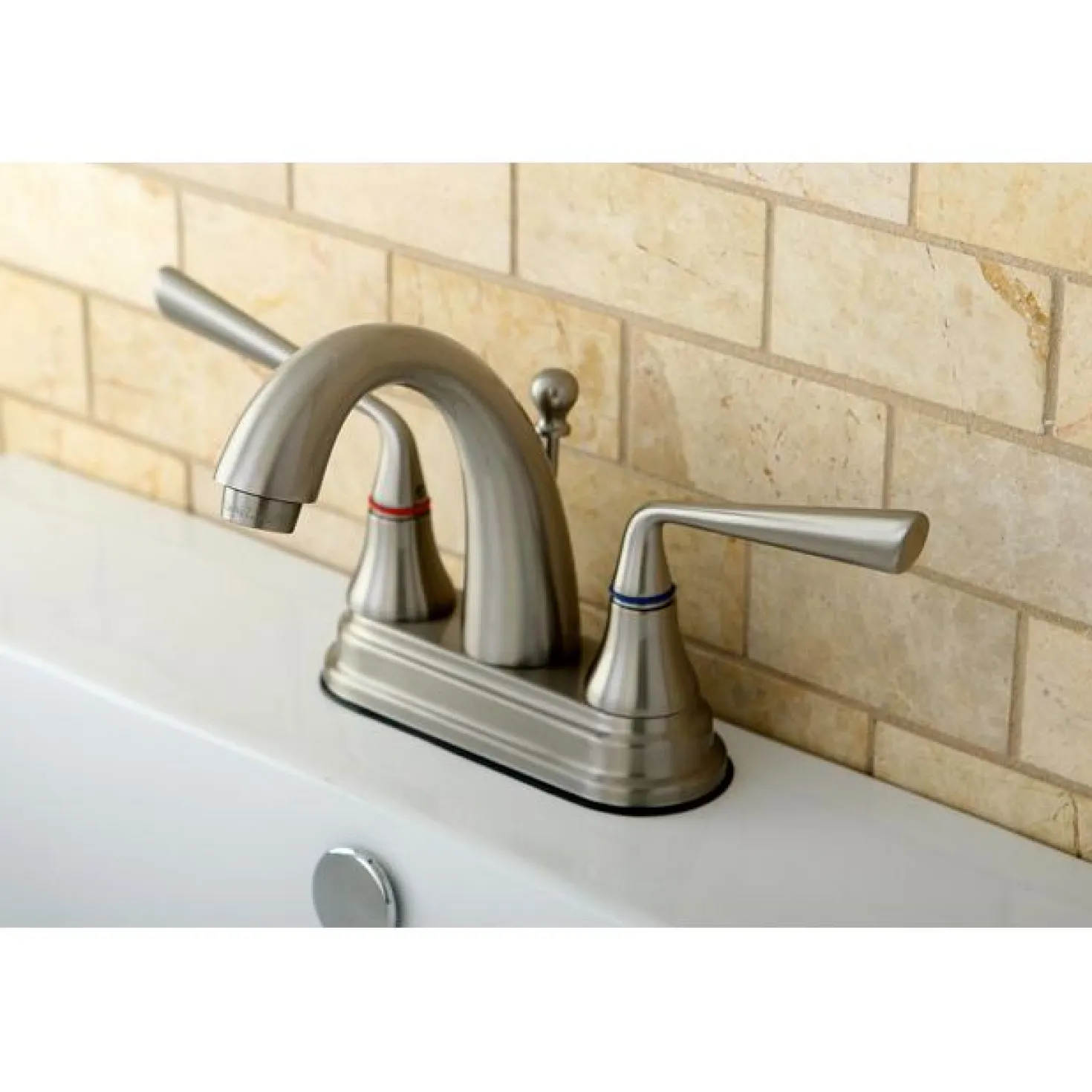 Kingston Brass Silver Sage 4" Centerset Two Handle Lavatory Faucet with Brass Pop-up