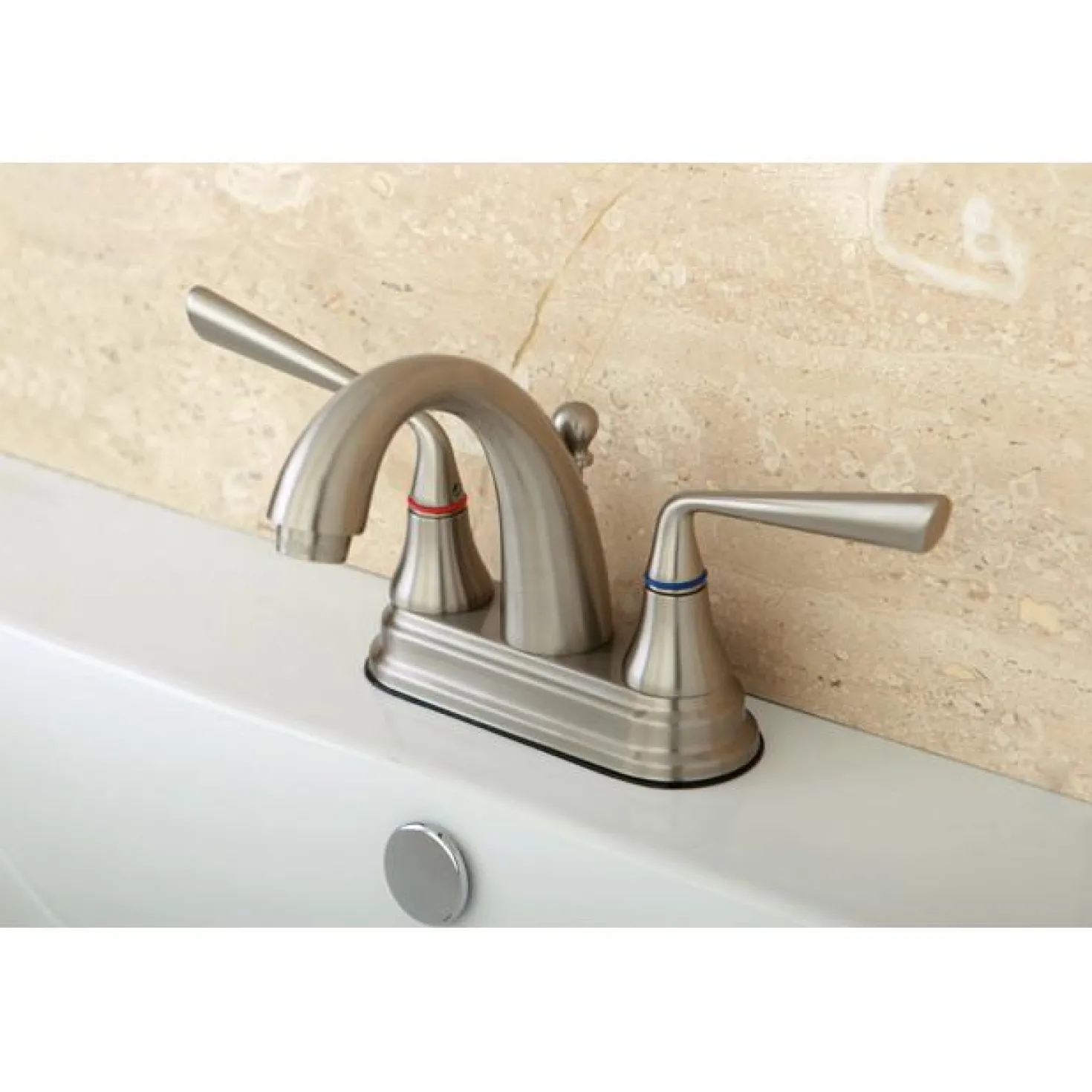 Kingston Brass Silver Sage 4" Centerset Two Handle Lavatory Faucet with Brass Pop-up