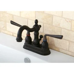 Kingston Brass Silver Sage Two Handle 4" Centerset Lavatory Faucet with Brass Pop-up
