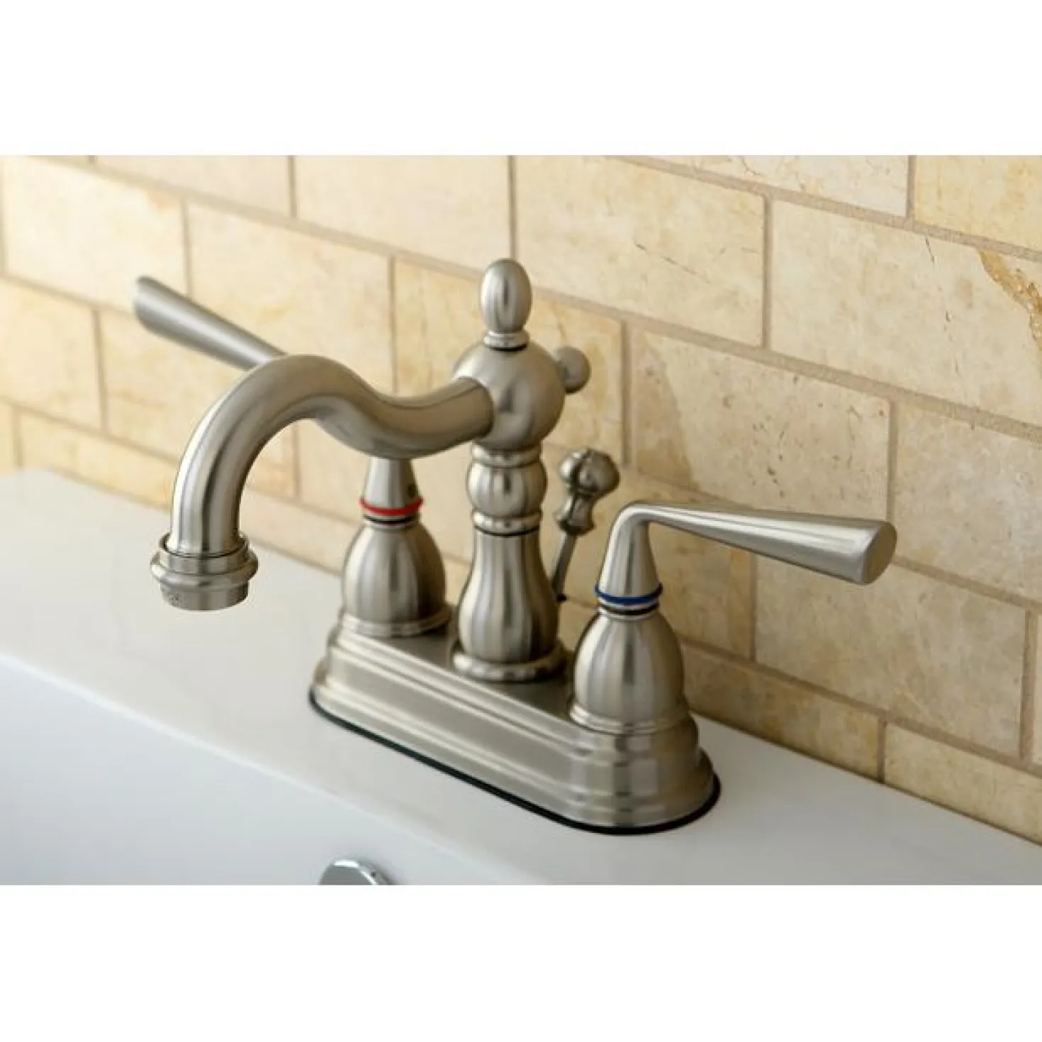 Kingston Brass Silver Sage Two Handle 4" Centerset Lavatory Faucet with Brass Pop-up