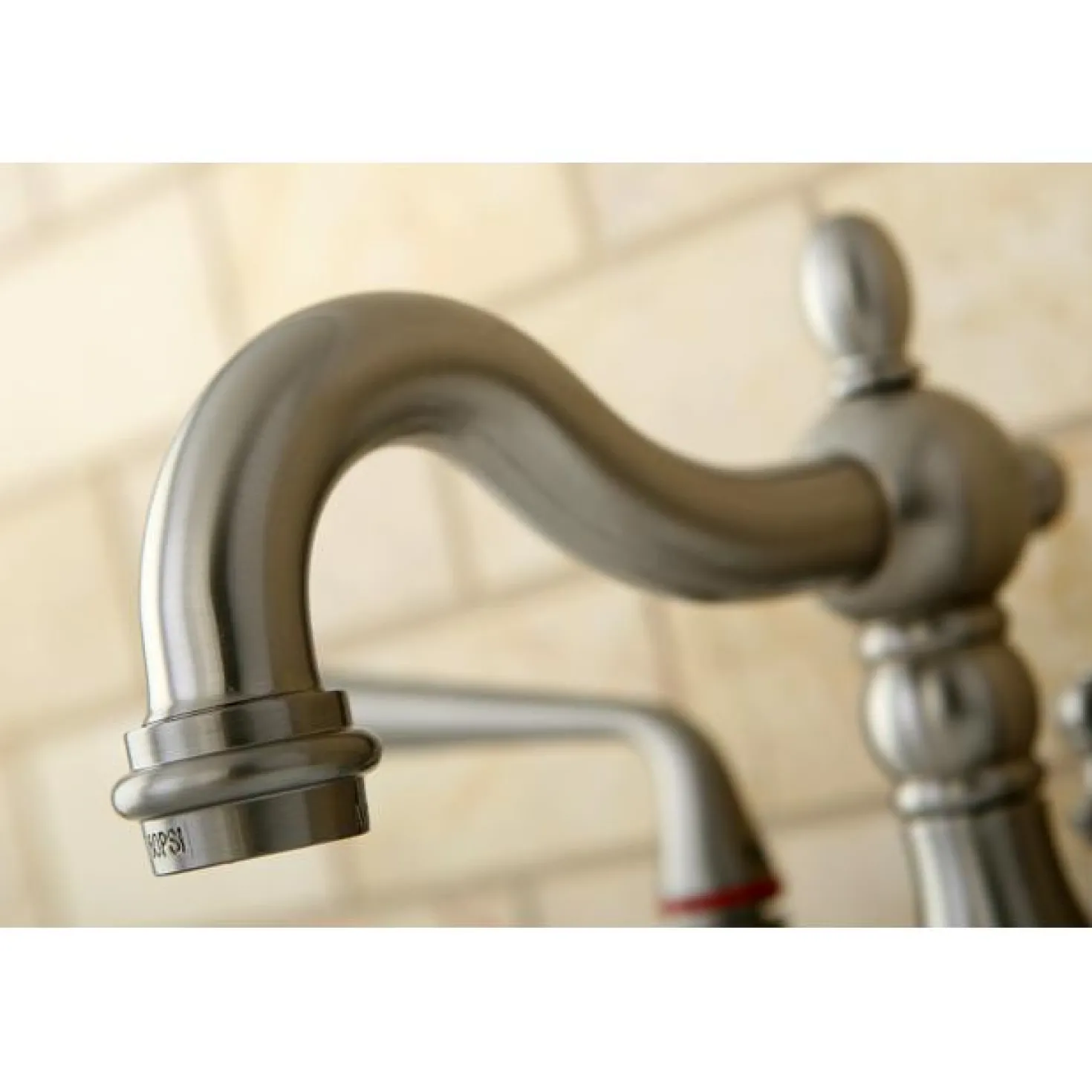 Kingston Brass Silver Sage Two Handle 4" Centerset Lavatory Faucet with Brass Pop-up