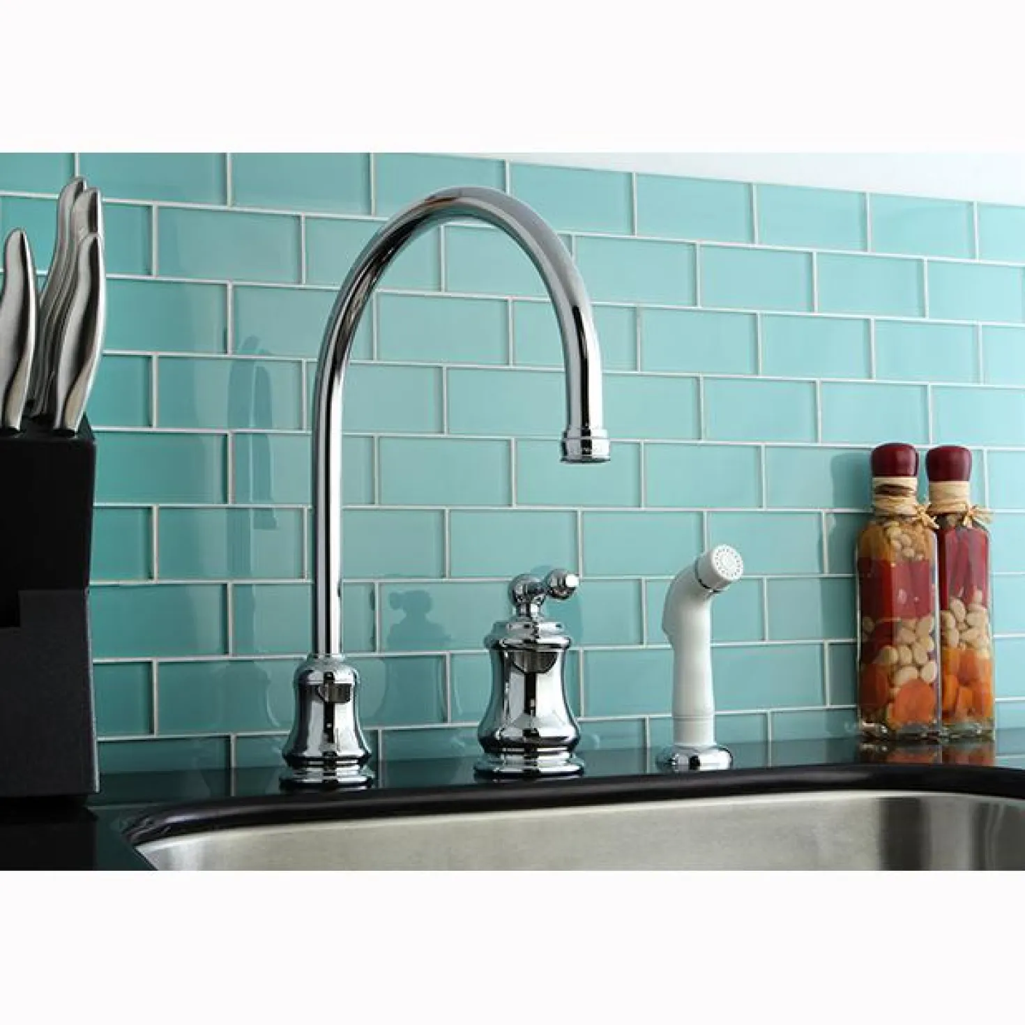 Kingston Brass Single Handle Widespread Kitchen Faucet with Non-Metallic Sprayer and Metal Lever Handle