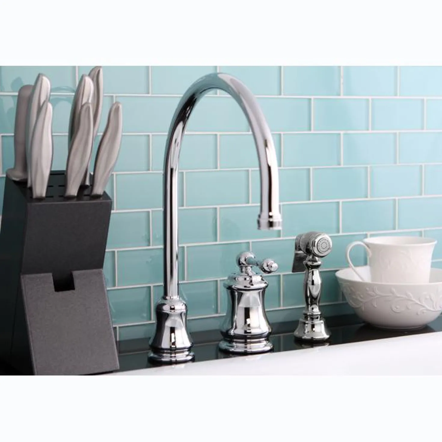 Kingston Brass Single Handle Widespread Kitchen Faucet with Brass Sprayer