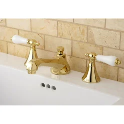 Kingston Brass Three-Hole 8-Inch Widespread Bathroom Faucet with Brass Pop-Up