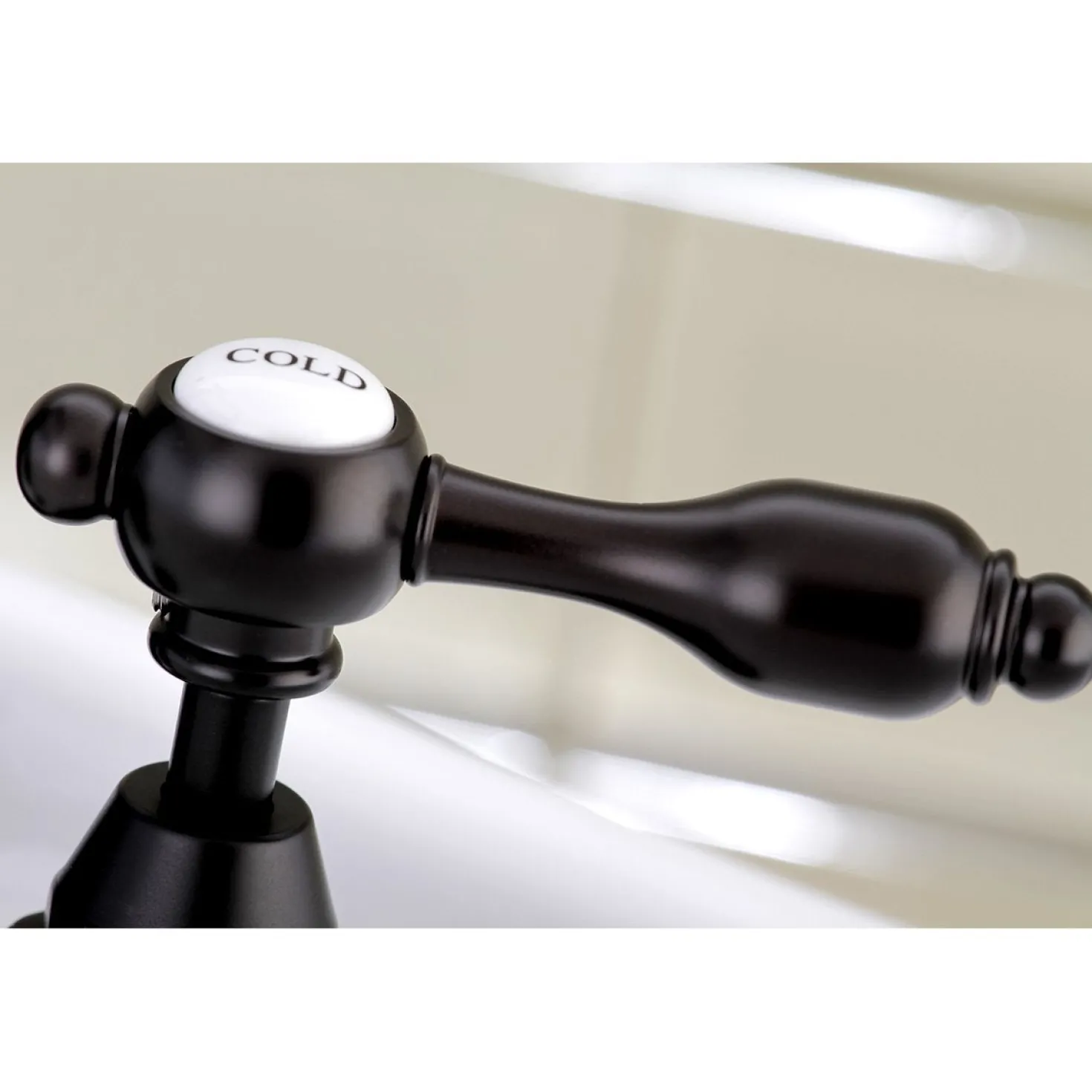 Kingston Brass Tudor Bridge Bathroom Faucet