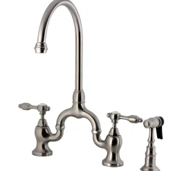 Kingston Brass Tudor Bridge Deck Mount Kitchen Faucet with Brass Sprayer