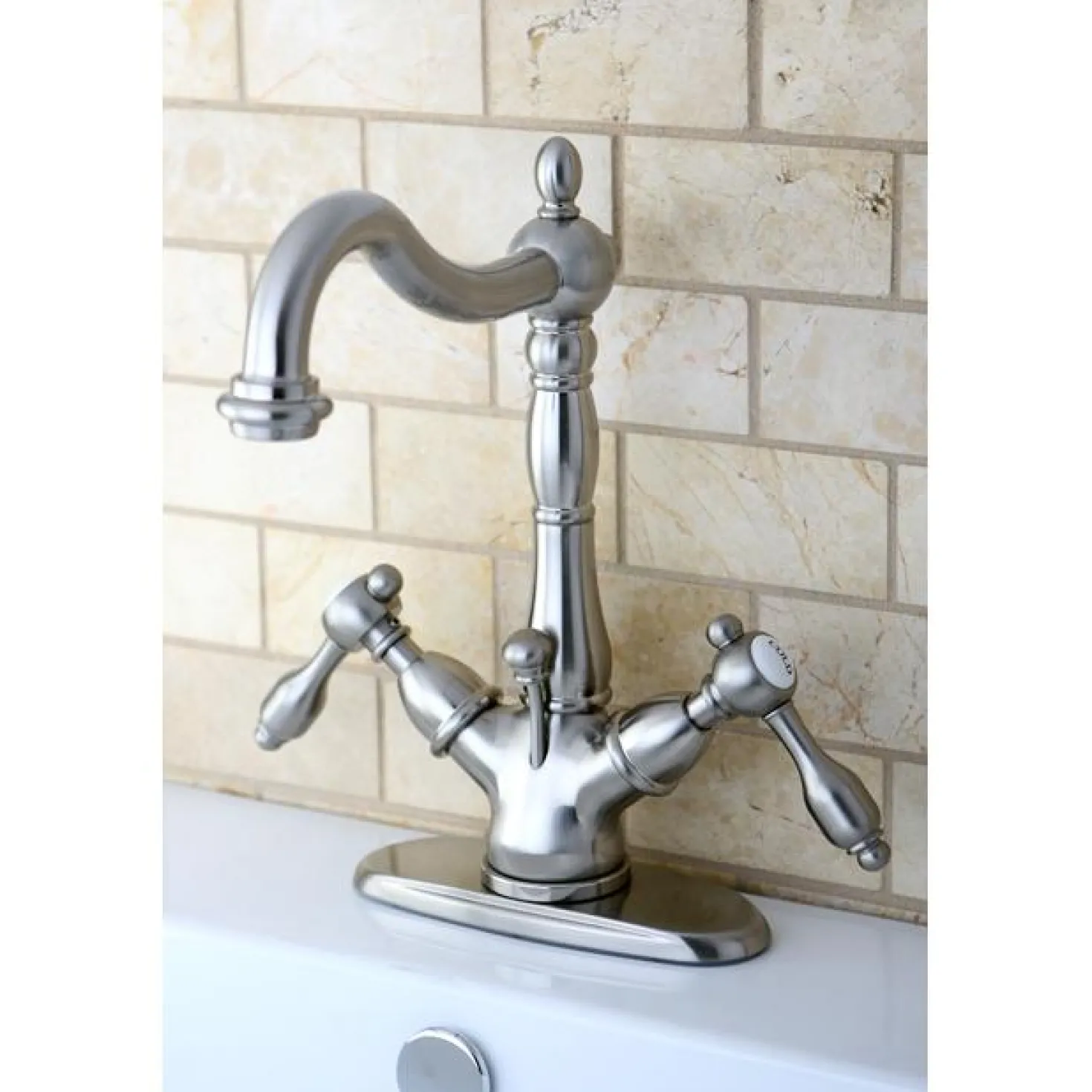 Kingston Brass Tudor 4" Center Lavatory Faucet with Brass Pop-up