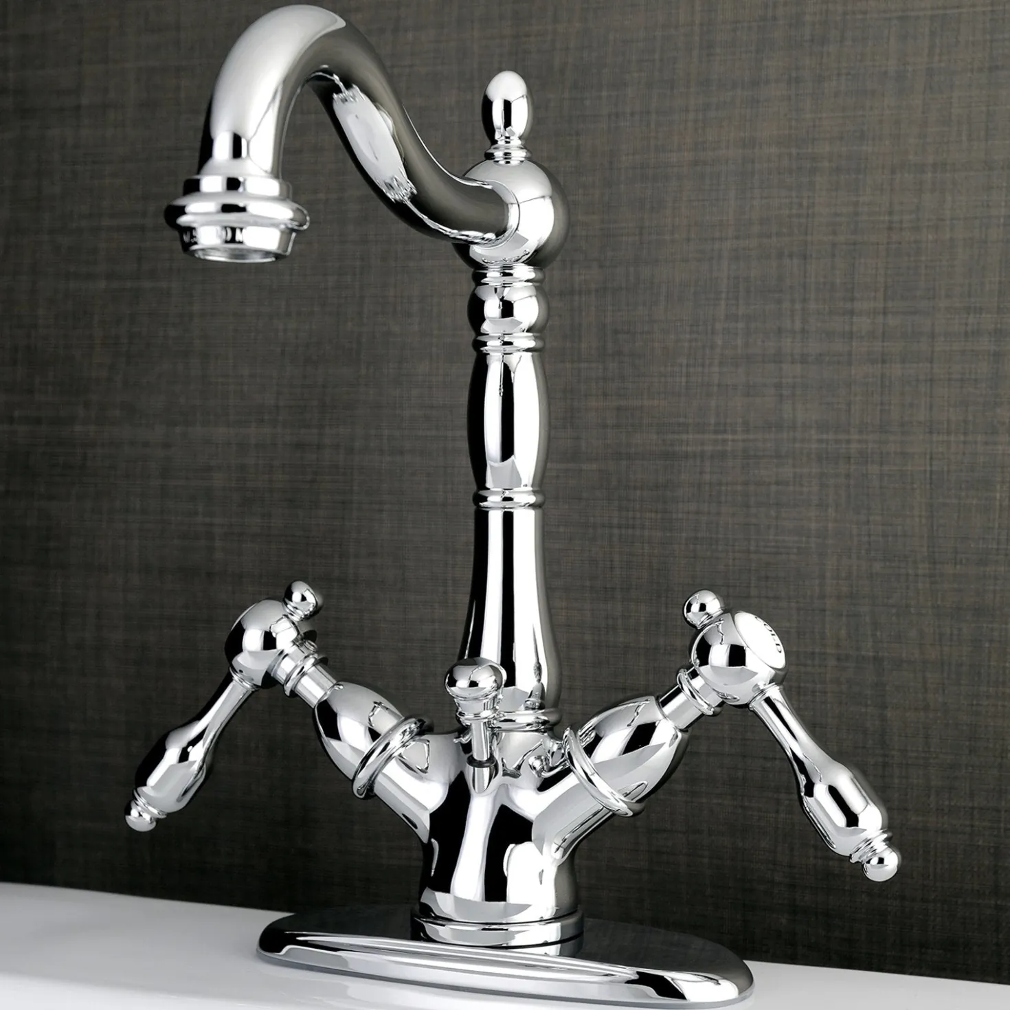 Kingston Brass Tudor 4" Center Lavatory Faucet with Brass Pop-up