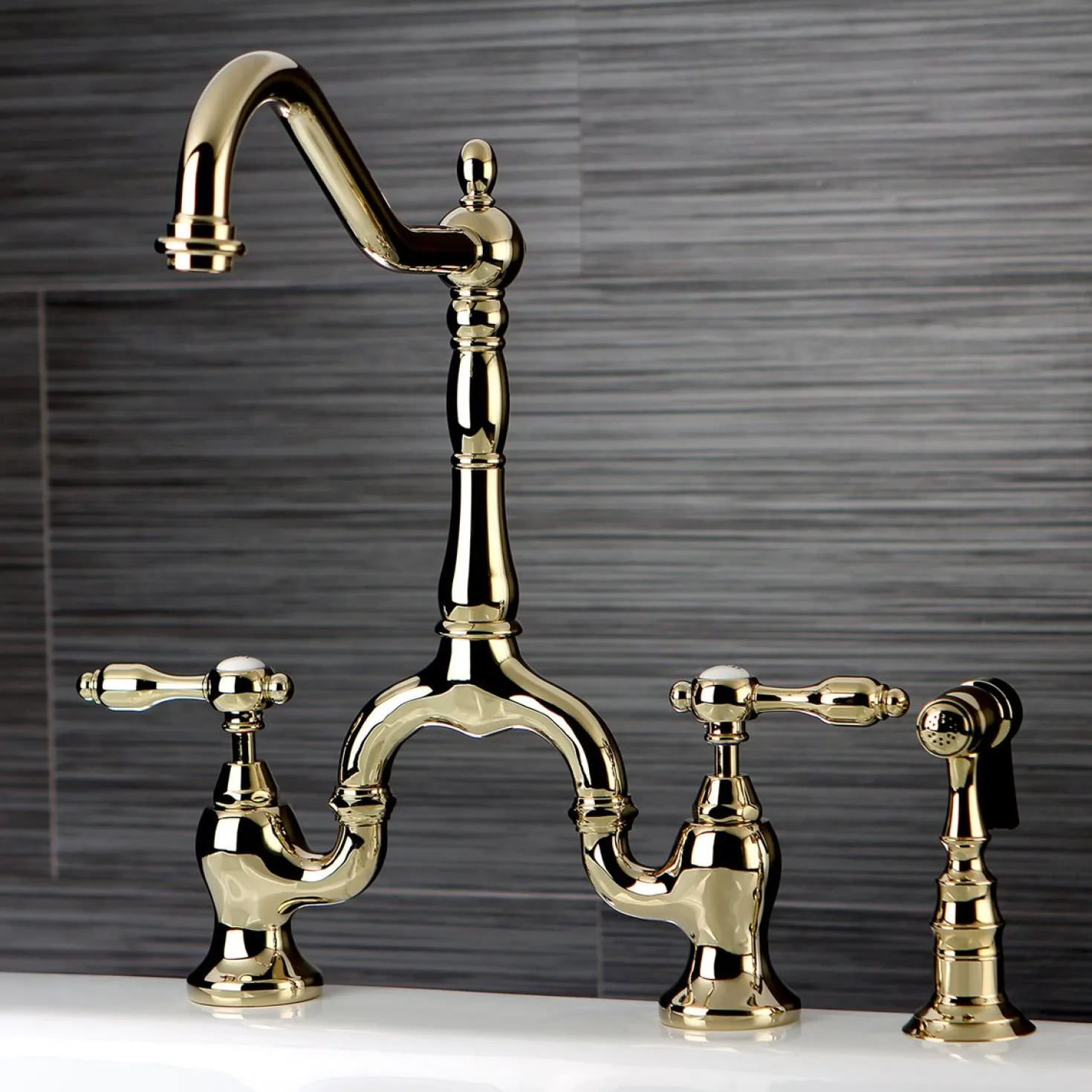 Kingston Brass Tudor Deck Mount Bridge Kitchen Faucet with Brass Sprayer