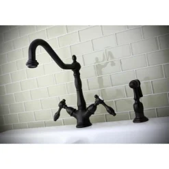 Kingston Brass Tudor Mono Deck Mount Kitchen Faucet with Brass Sprayer