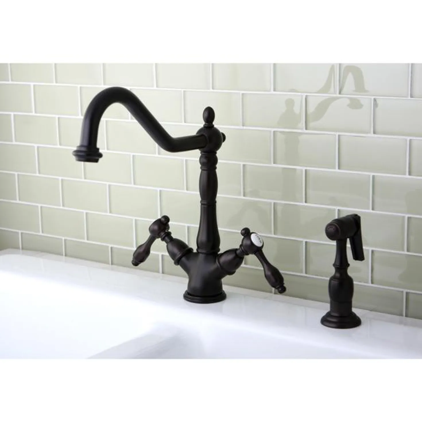 Kingston Brass Tudor Mono Deck Mount Kitchen Faucet with Brass Sprayer
