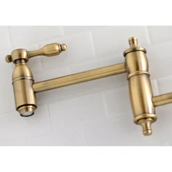 Kingston Brass Tudor Wall Mount Pot Filler Kitchen Faucet