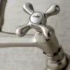 Kingston Brass Vintage 8" Center Wall Mount Bathroom Faucet