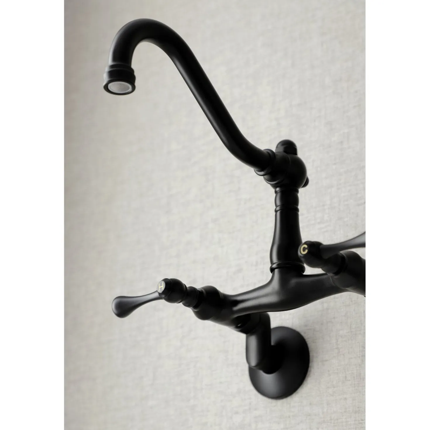 Kingston Brass Vintage 6-Inch Adjustable Center Wall Mount Kitchen Faucet