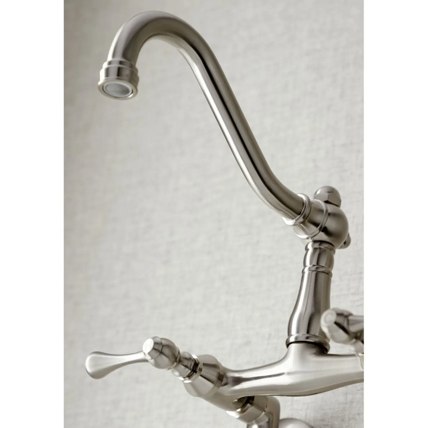 Kingston Brass Vintage 6-Inch Adjustable Center Wall Mount Kitchen Faucet