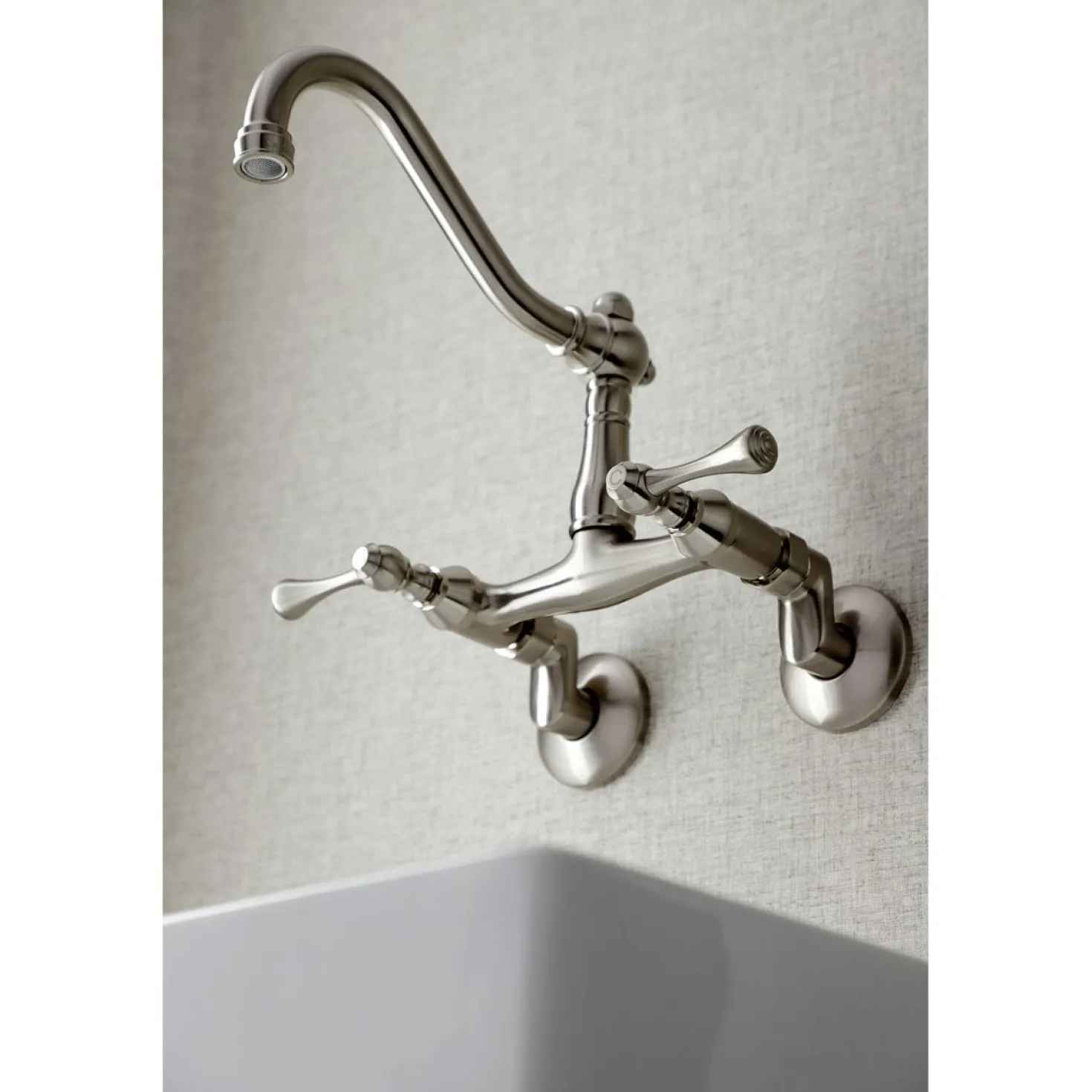 Kingston Brass Vintage 6-Inch Adjustable Center Wall Mount Kitchen Faucet