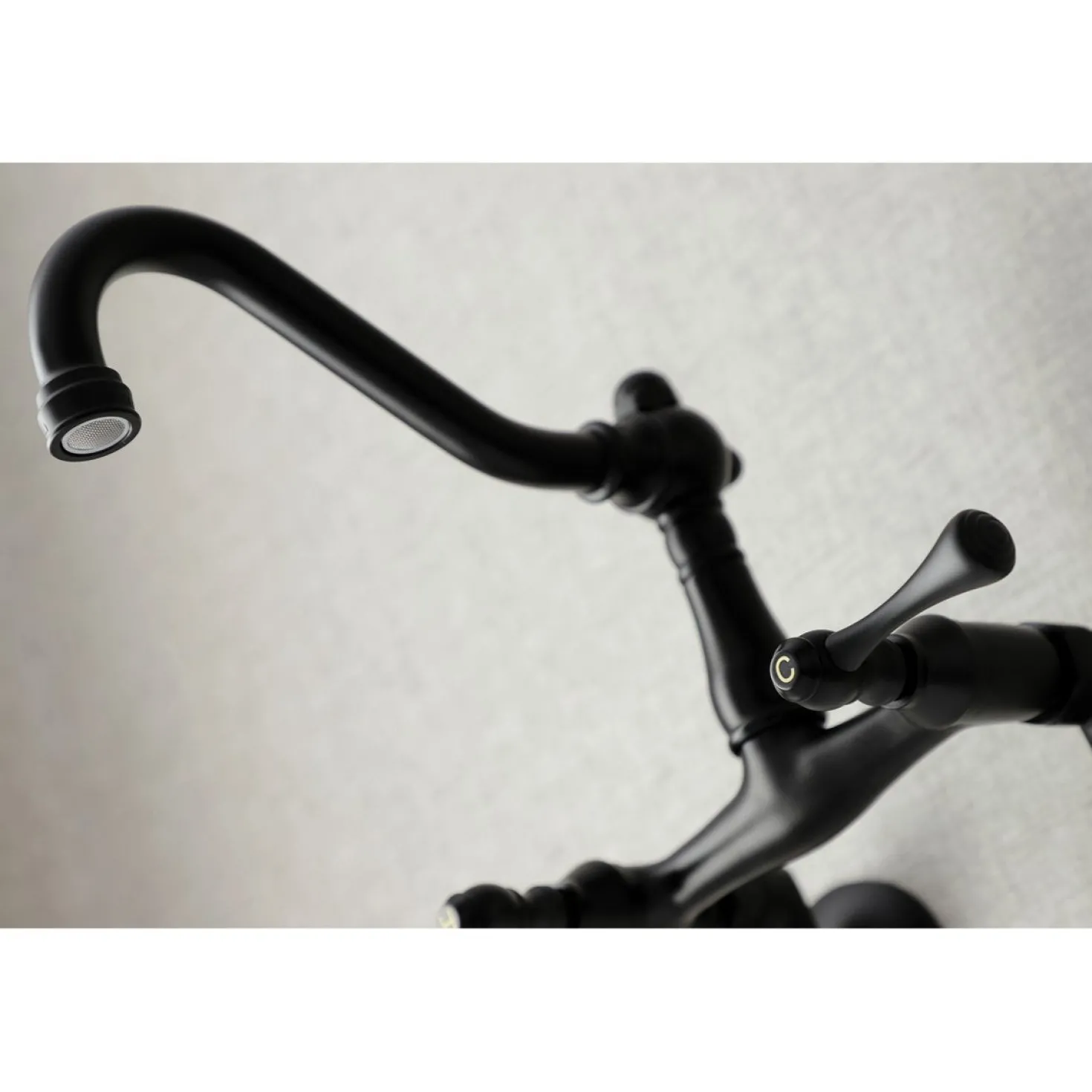 Kingston Brass Vintage 6-Inch Adjustable Center Wall Mount Kitchen Faucet