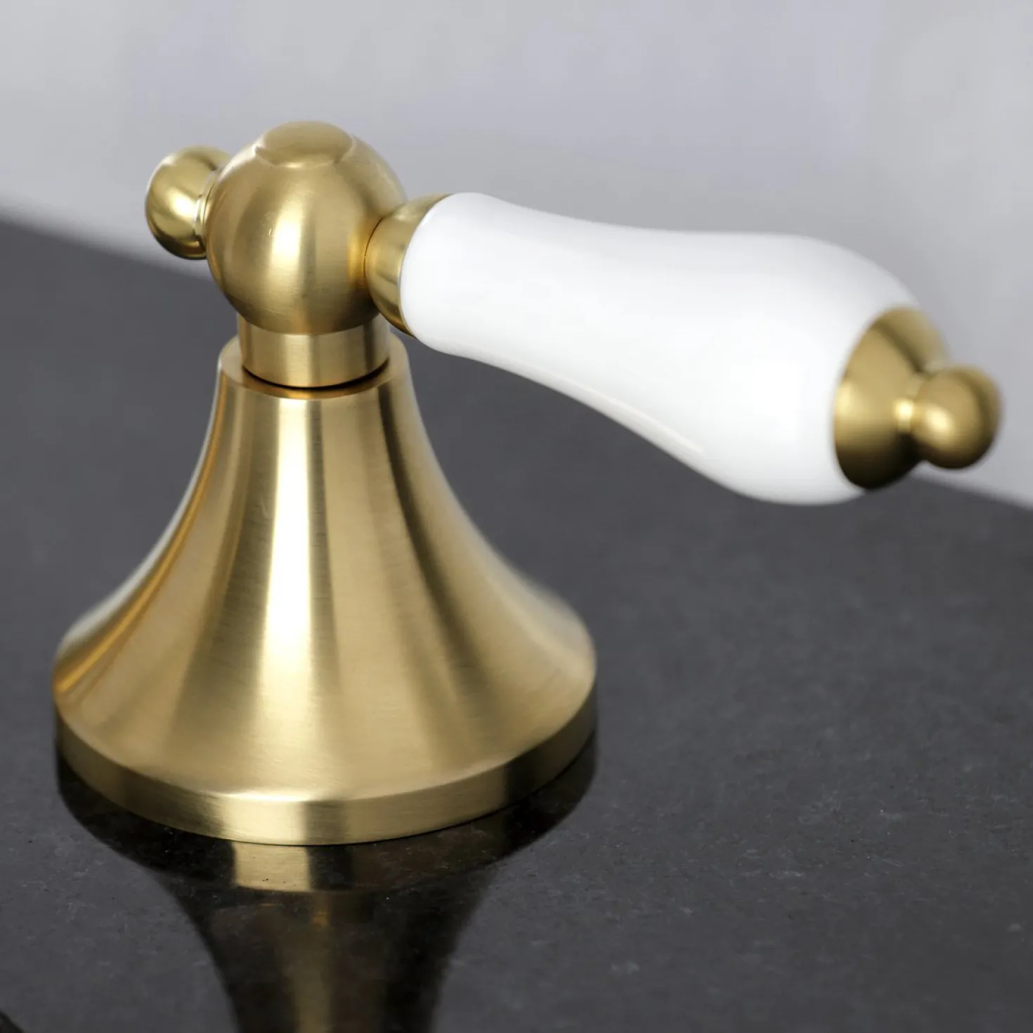 Kingston Brass Vintage 8-Inch Widespread Three-Hole Bathroom Faucet