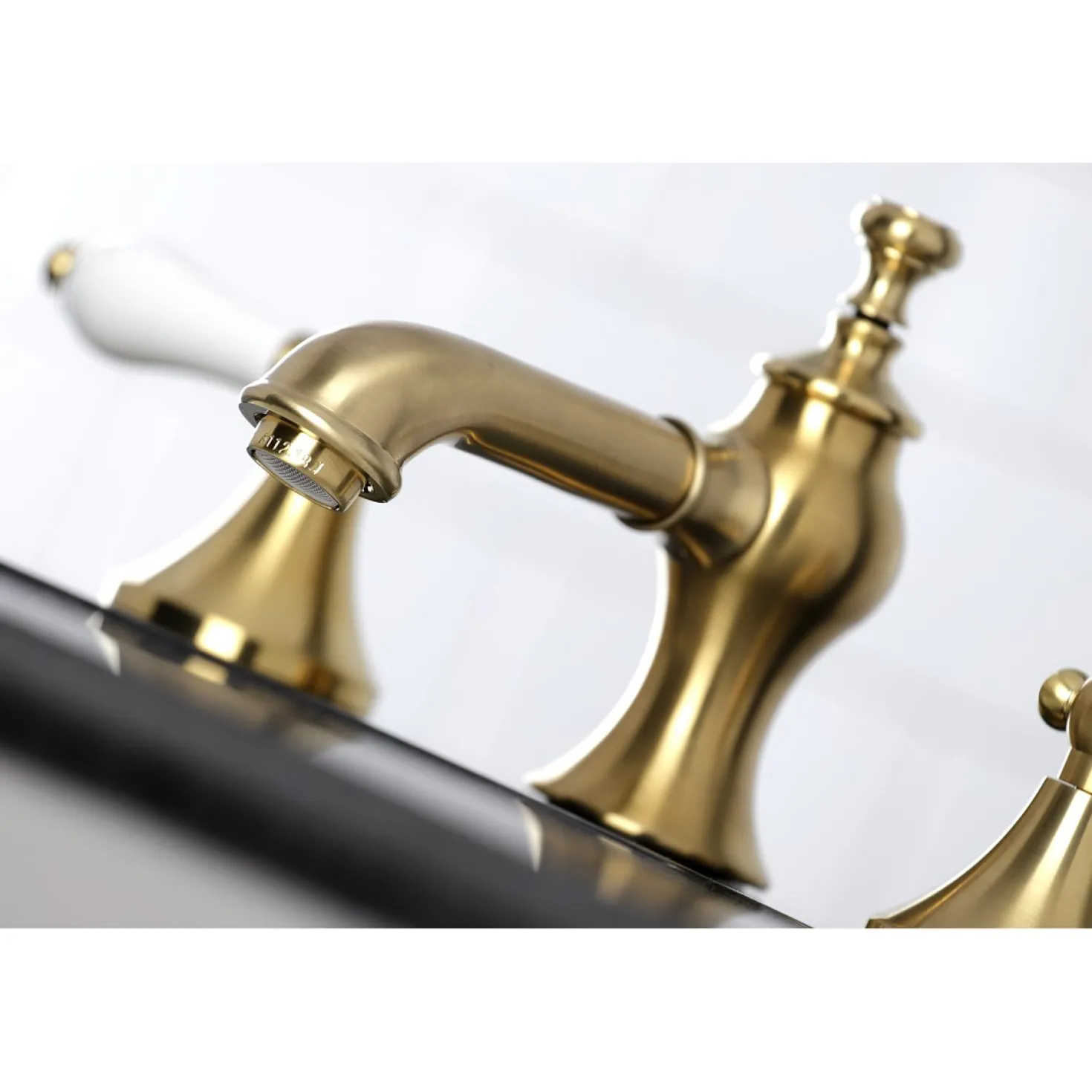 Kingston Brass Vintage 8-Inch Widespread Three-Hole Bathroom Faucet