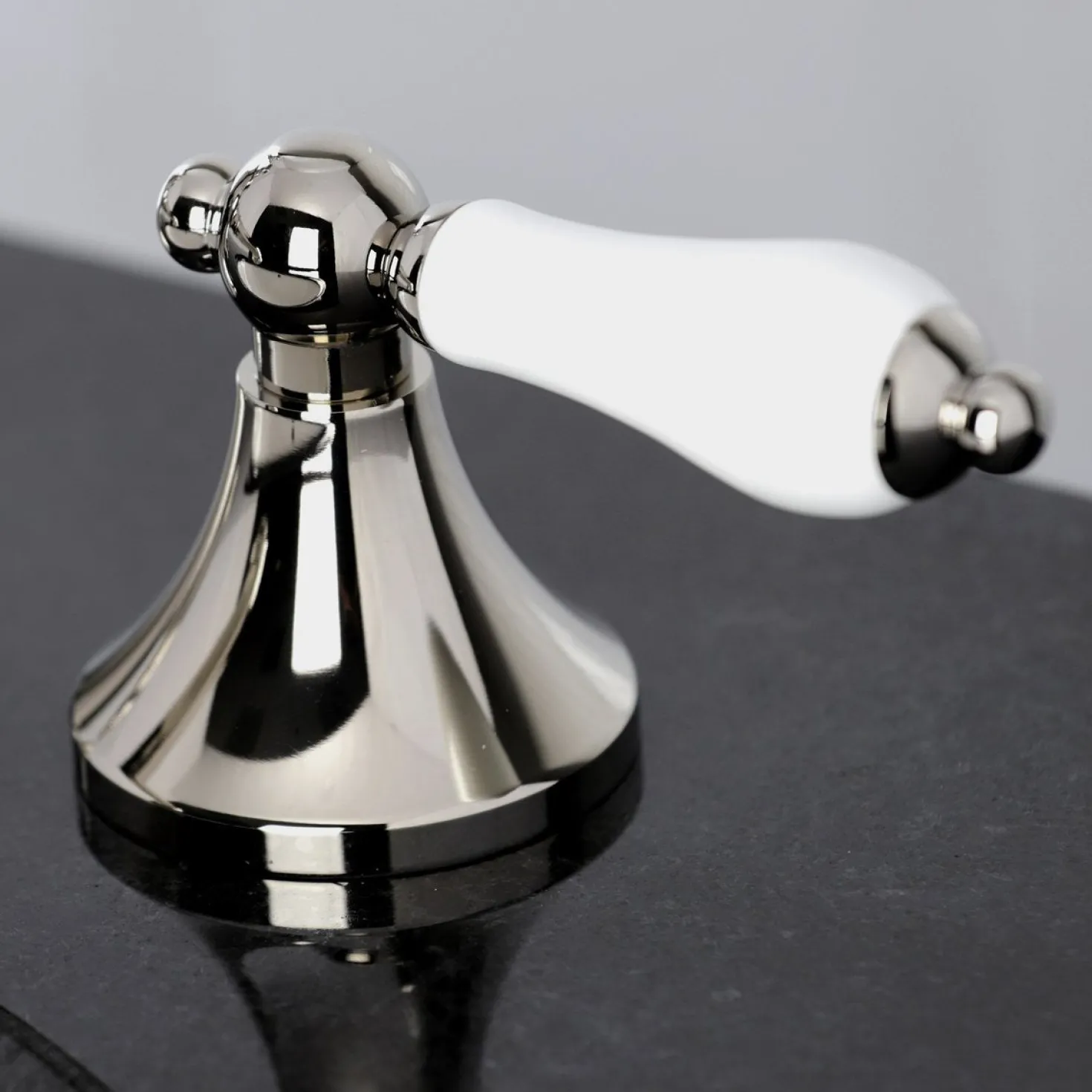 Kingston Brass Vintage 8-Inch Widespread Three-Hole Bathroom Faucet