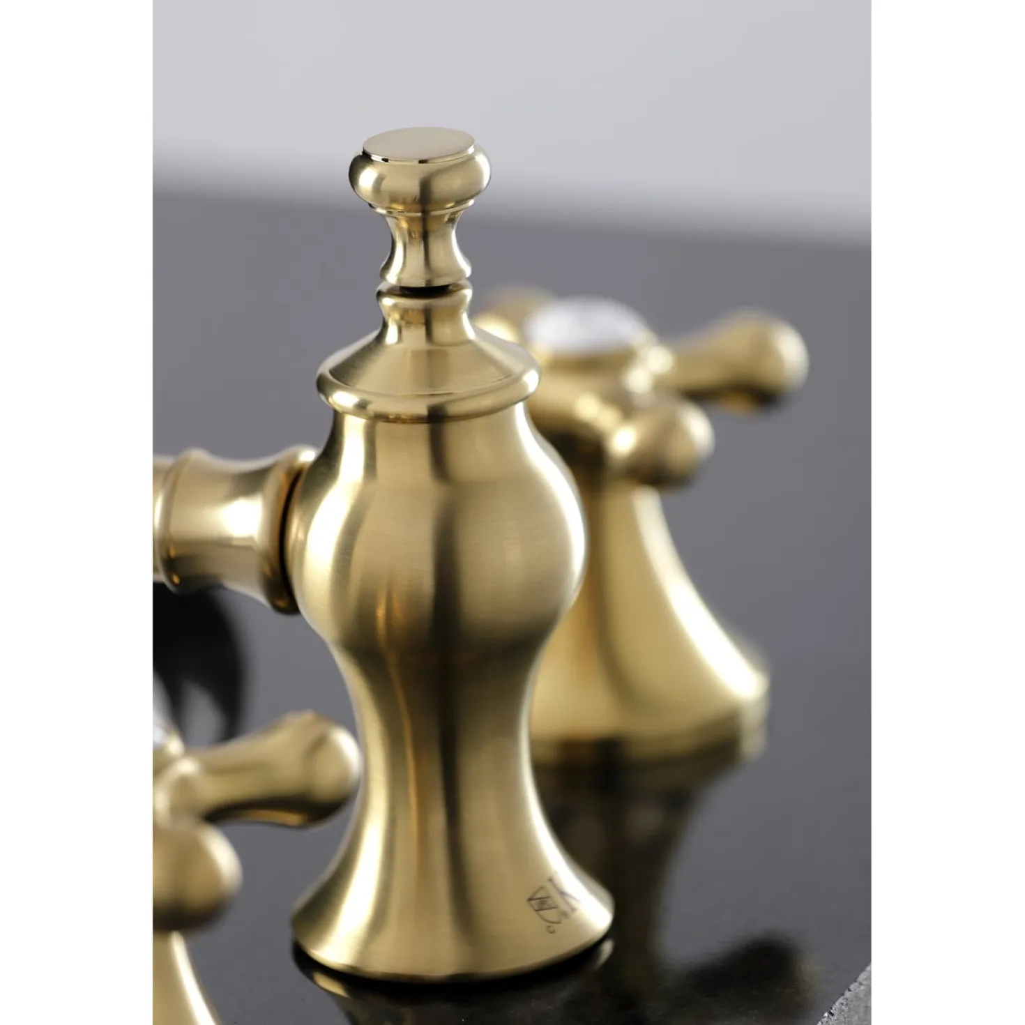 Kingston Brass Vintage Three-Hole 8-Inch Widespread Bathroom Faucet