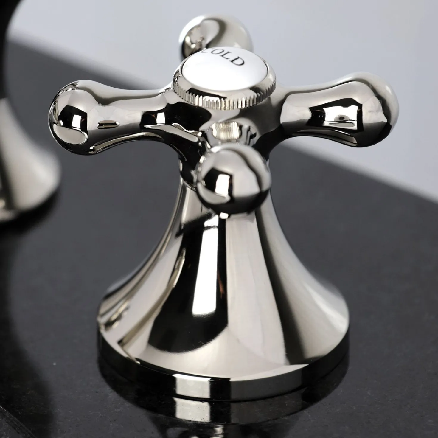 Kingston Brass Vintage Three-Hole 8-Inch Widespread Bathroom Faucet