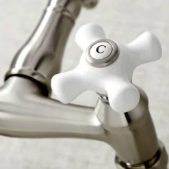 Kingston Brass Vintage Wall Mount 6-Inch Adjustable Center Kitchen Faucet
