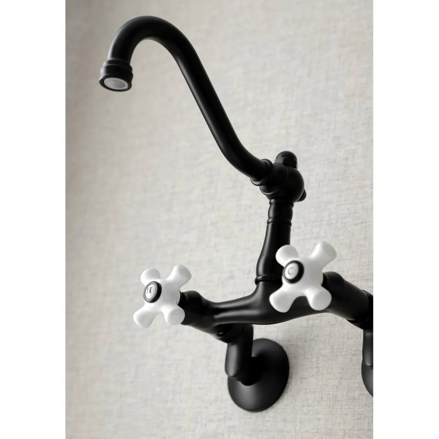 Kingston Brass Vintage Wall Mount 6-Inch Adjustable Center Kitchen Faucet
