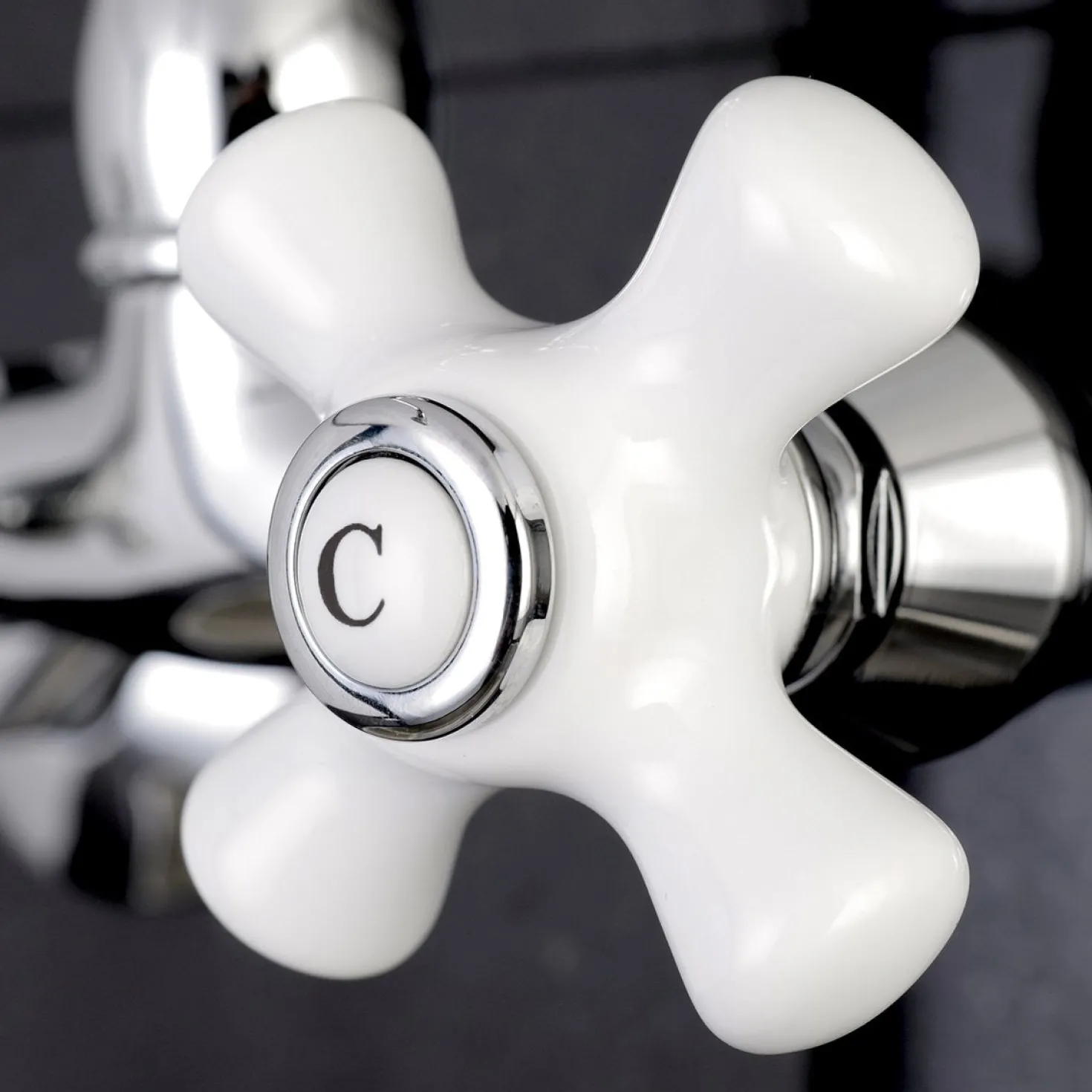 Kingston Brass Vintage Wall Mount 6-Inch Adjustable Center Kitchen Faucet