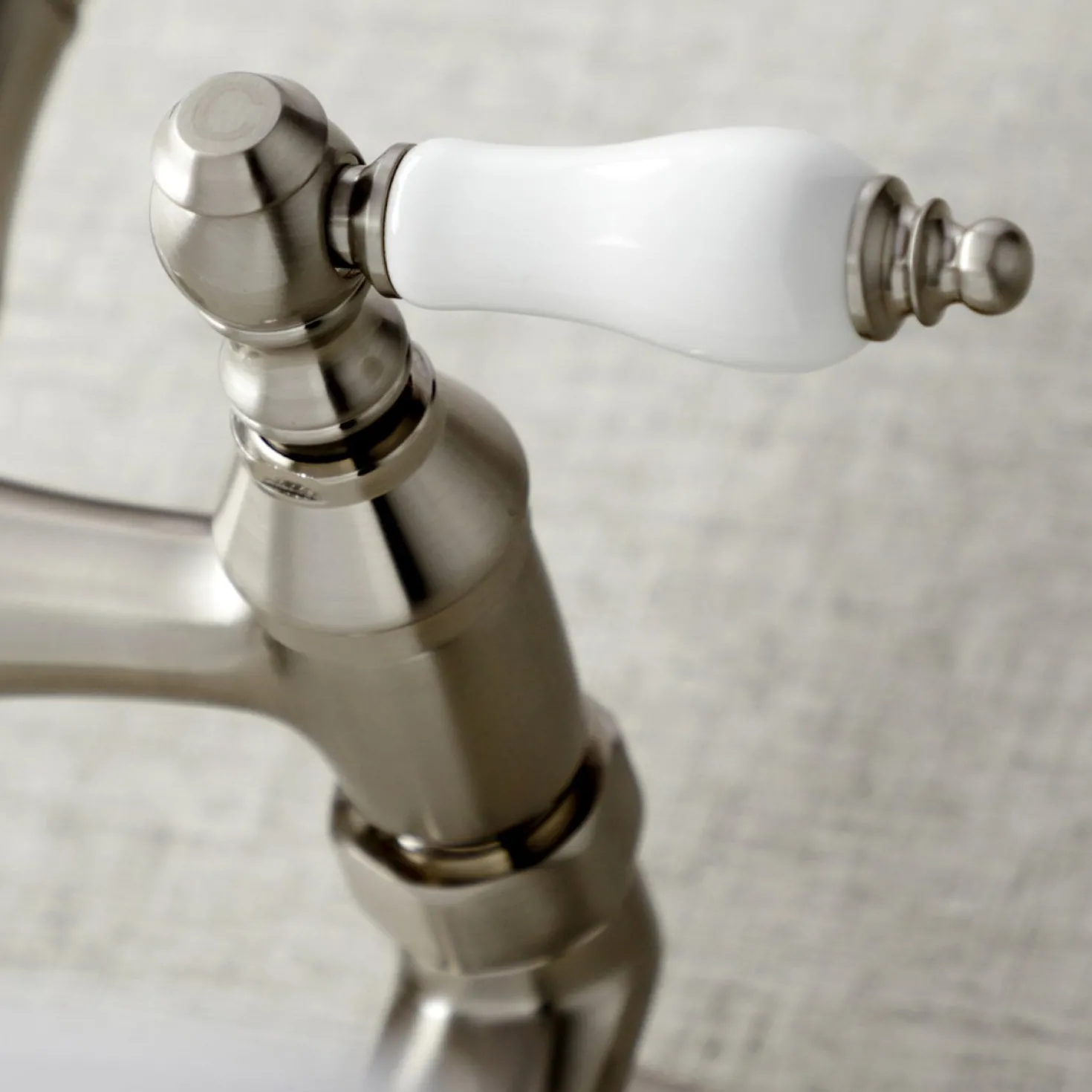 Kingston Brass Vintage Wall Mount 6" Adjustable Center Kitchen Faucet