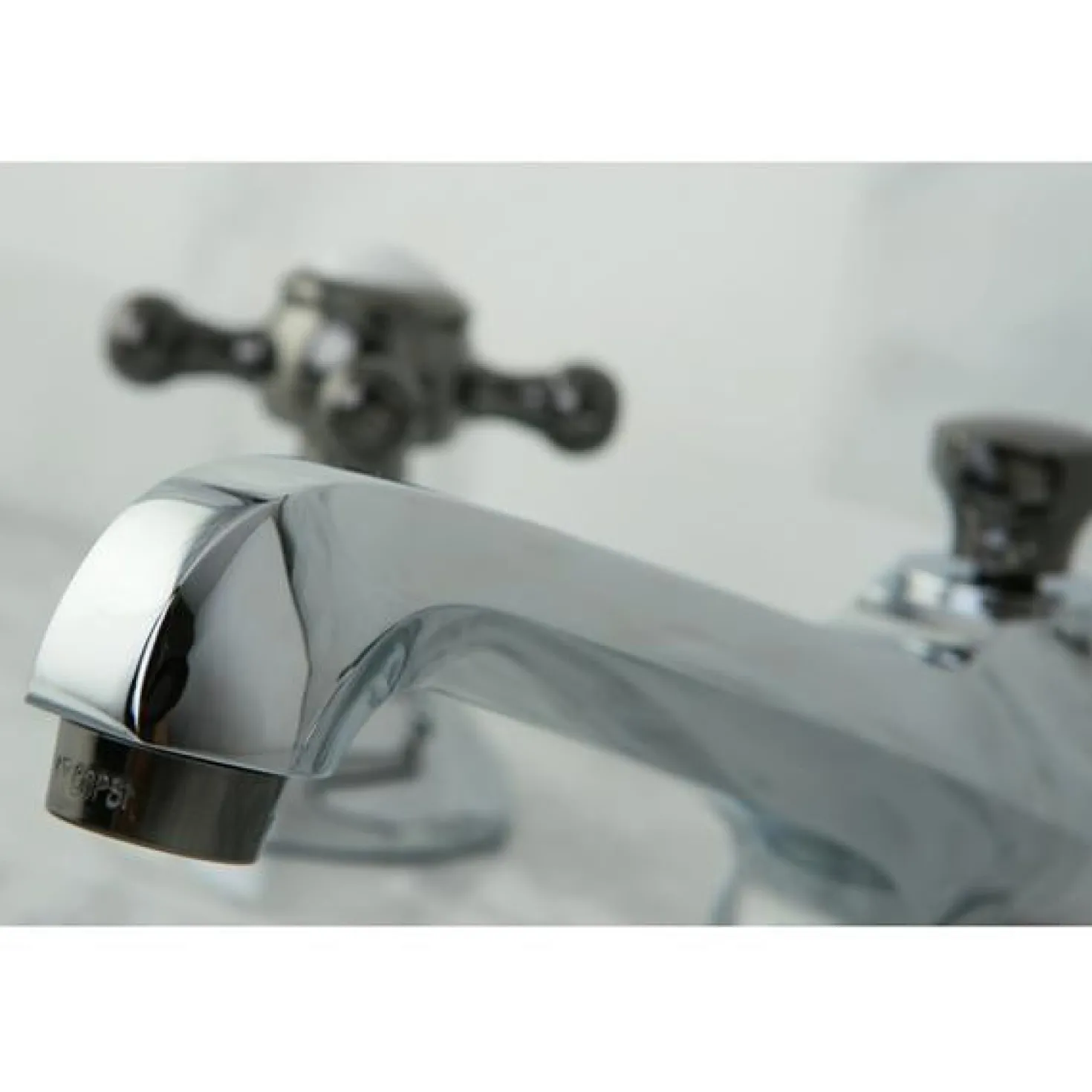 Kingston Brass Water Onyx 8" to 16" Widespread Lavatory Faucet with Brass Pop-up Drain