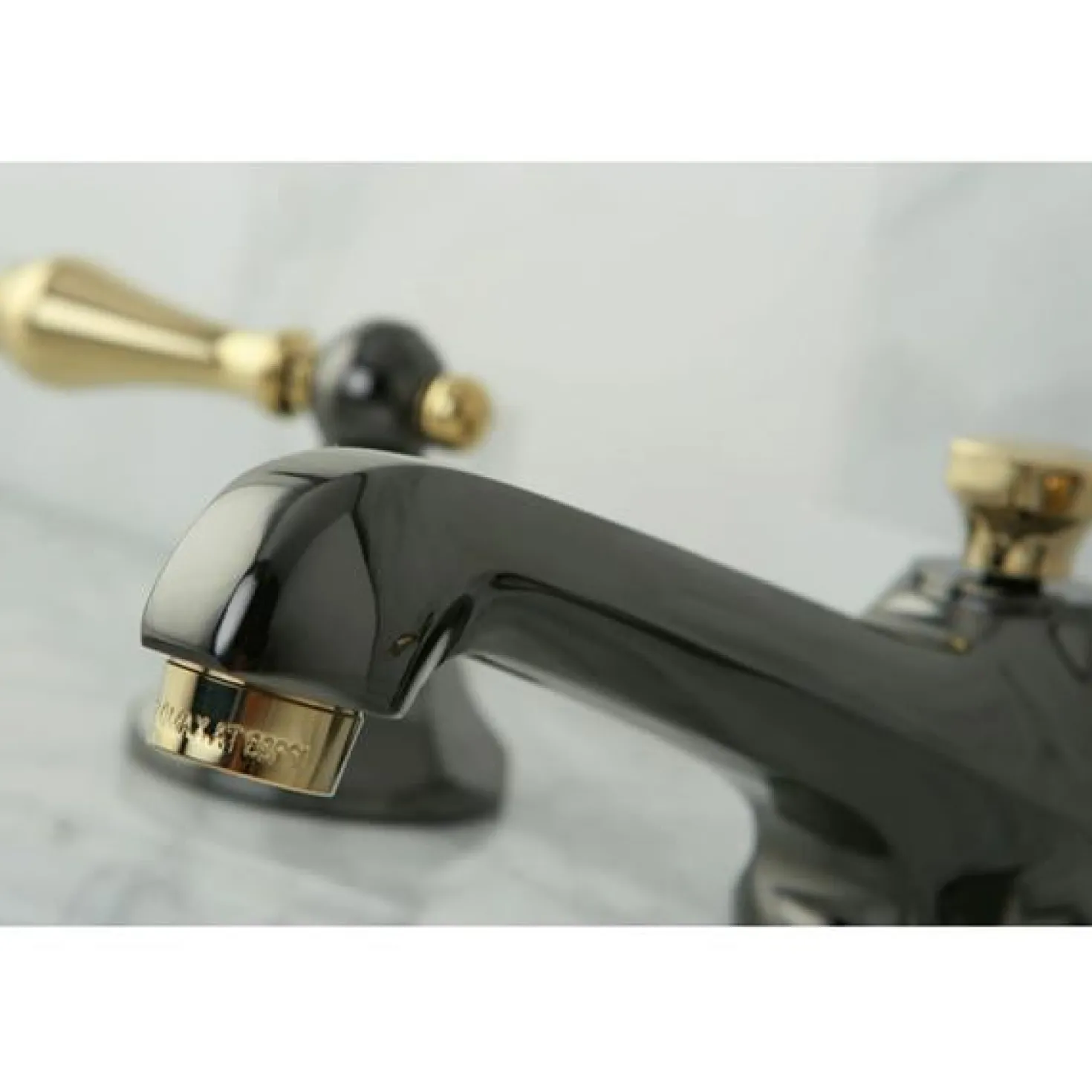 Kingston Brass Water Onyx 8" to 16" Widespread Three Hole Lavatory Faucet with Brass Pop-up Drain