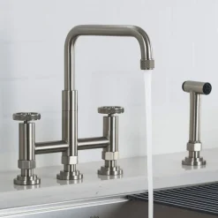 KRAUS Urbix Bridge Kitchen Faucet with Side Sprayer in Spot Free Stainless Steel