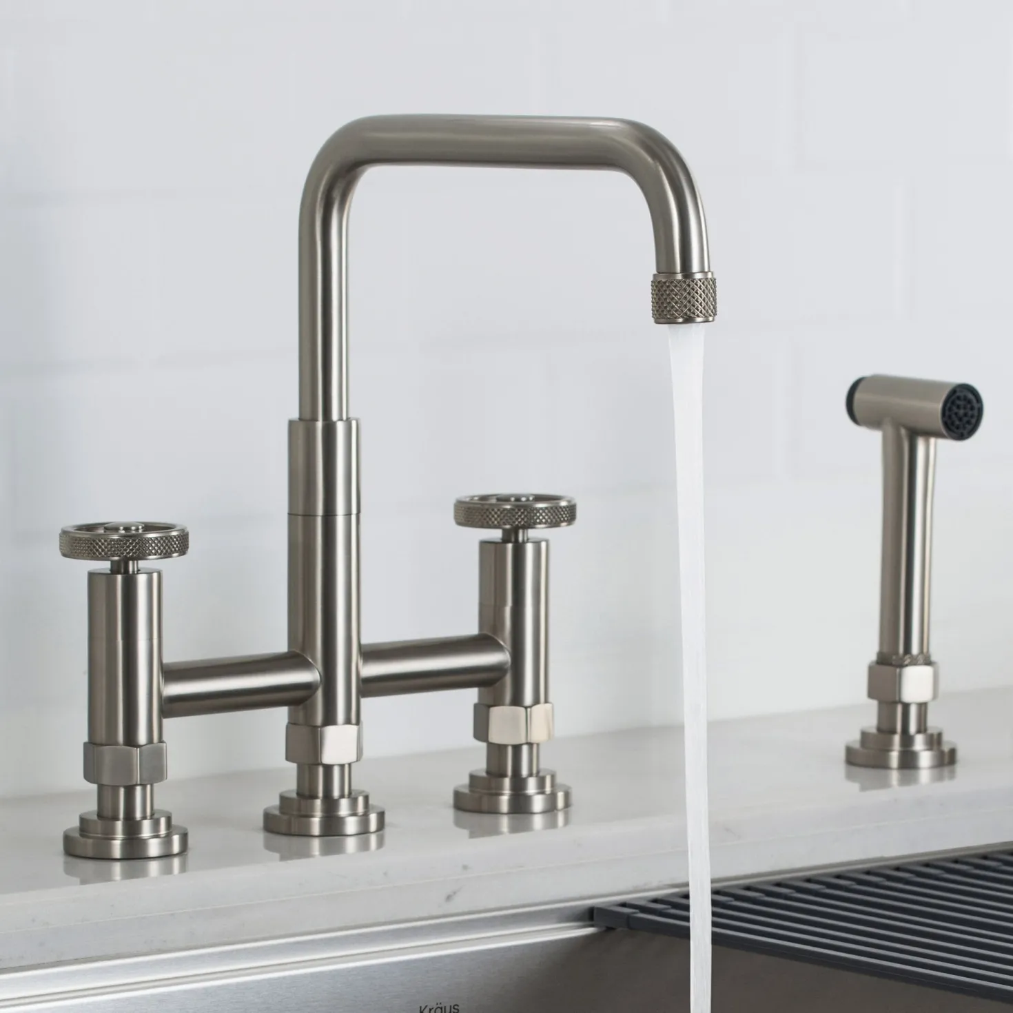 KRAUS Urbix Bridge Kitchen Faucet with Side Sprayer in Spot Free Stainless Steel