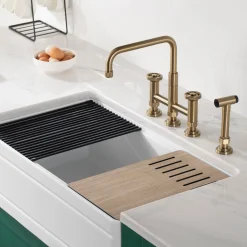 KRAUS Urbix Bridge Kitchen Faucet with Side Sprayer in Brushed Gold