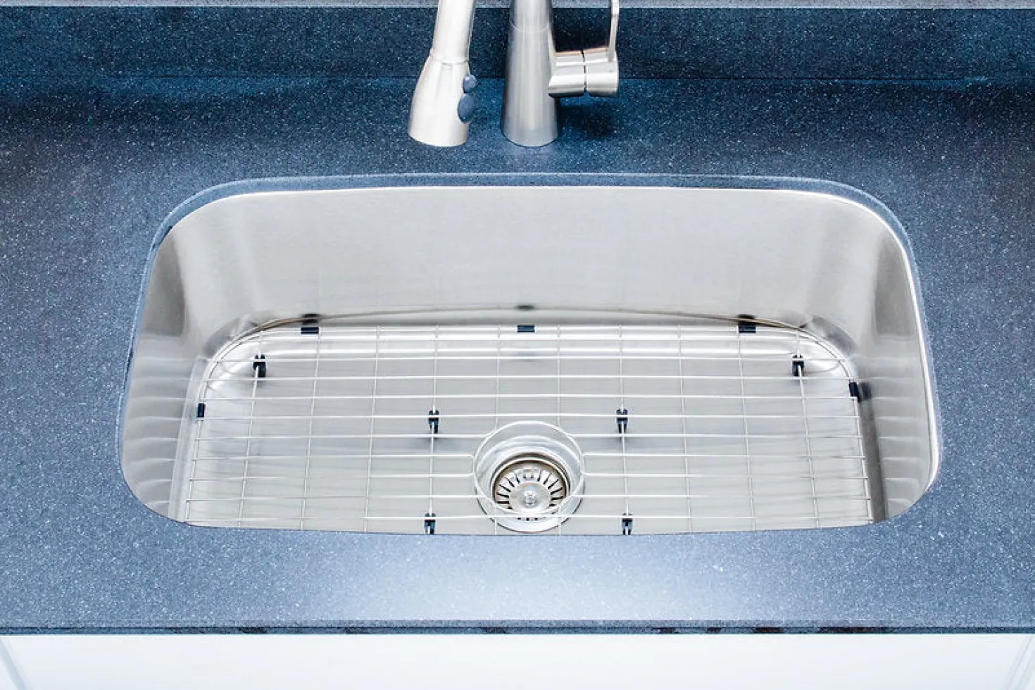 Wells Sinkware 32" 16-Gauge Undermount Single Bowl Stainless Steel Kitchen Sink with Grid Rack and Basket Strainer